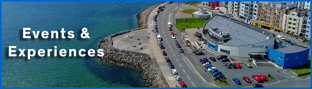 Events and Experiences in the Aquarium ad. A drone photo of the Aquarium and Galway Bay.