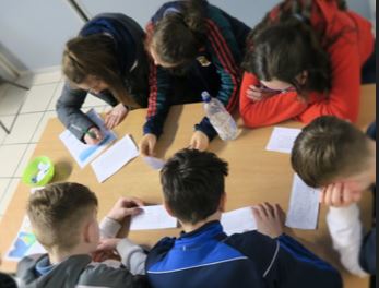 Students reading about different types of stakeholder in the marine environment