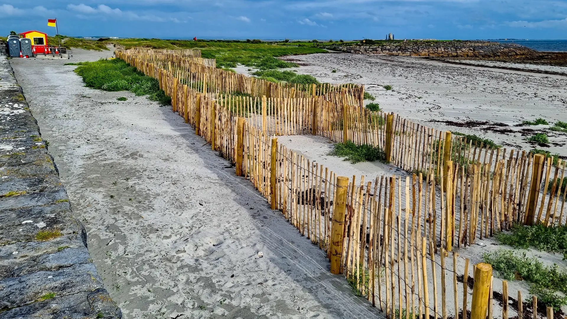 Grattan Beach, with the sand fences in the foreground.