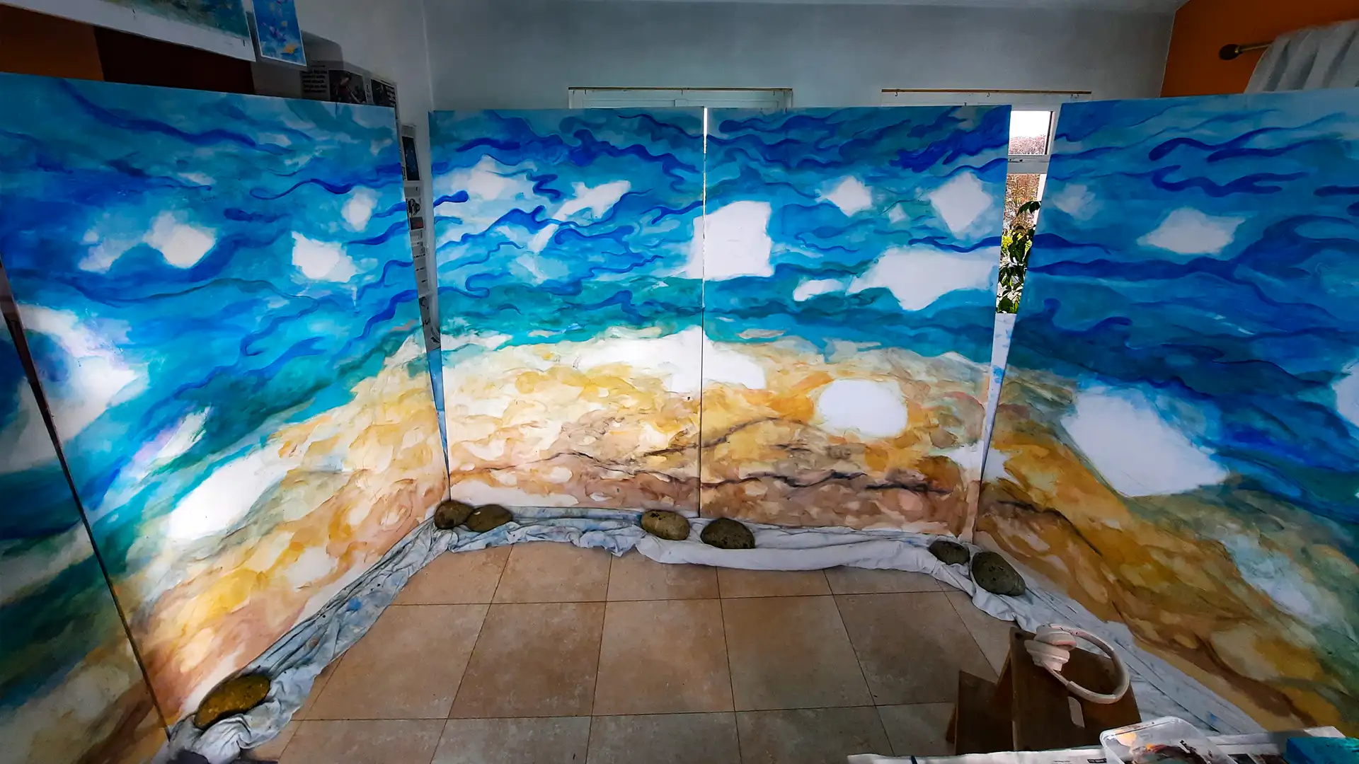 The murals start to develop